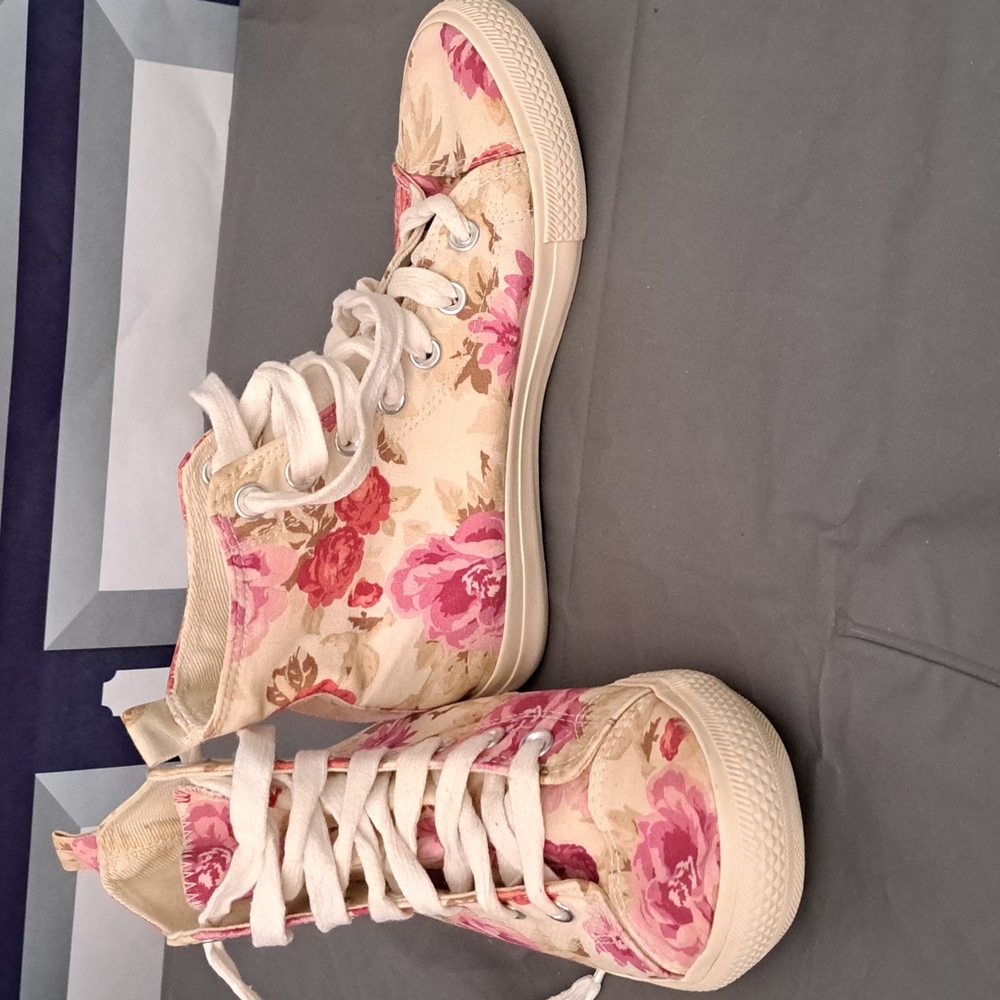 High top tennis shoes. Aeropostale. Lots of Pink Flowers in a Size 6
